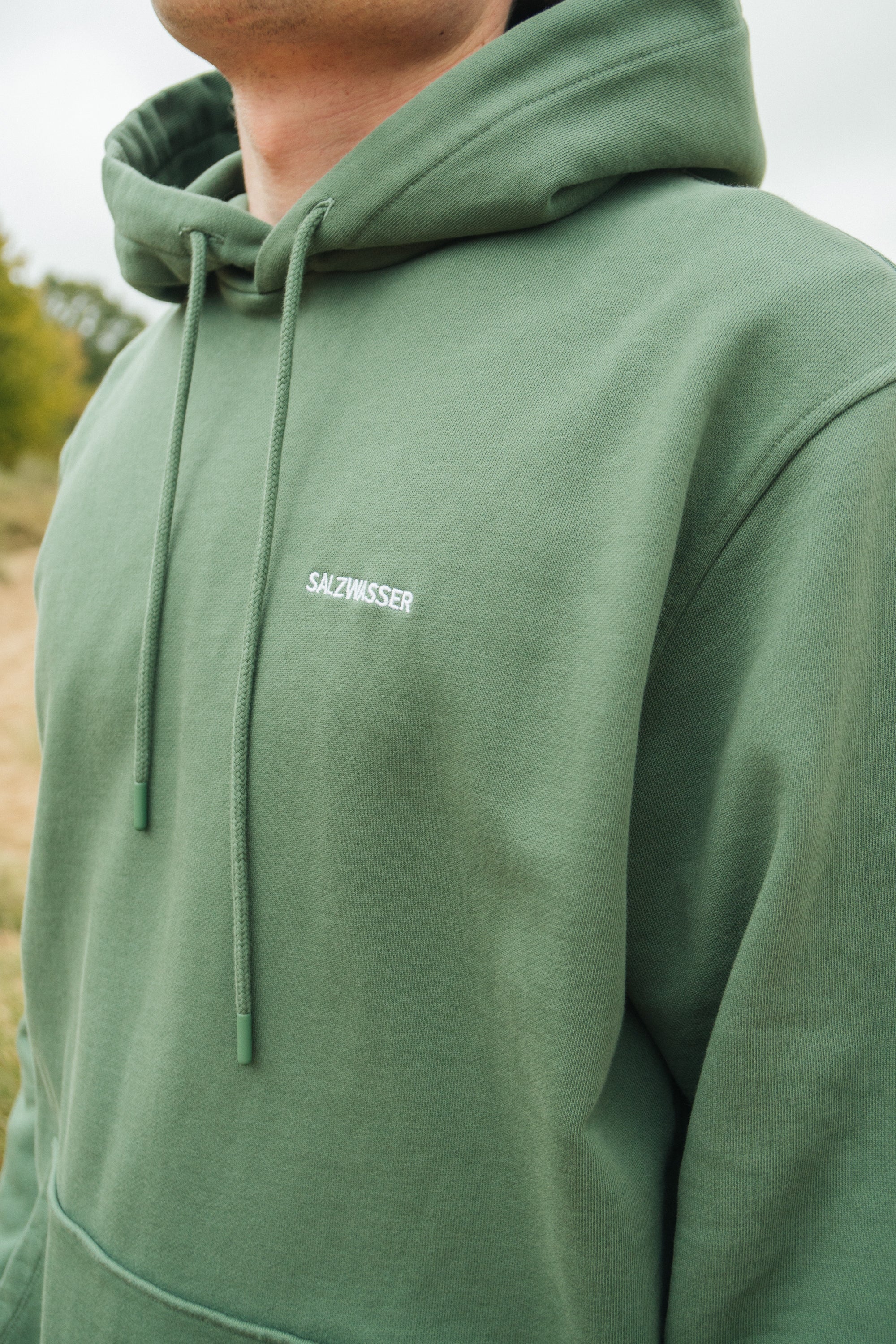 Nachhaltiger Kapuzenpullover in Grün von SALZWASSER _men _women